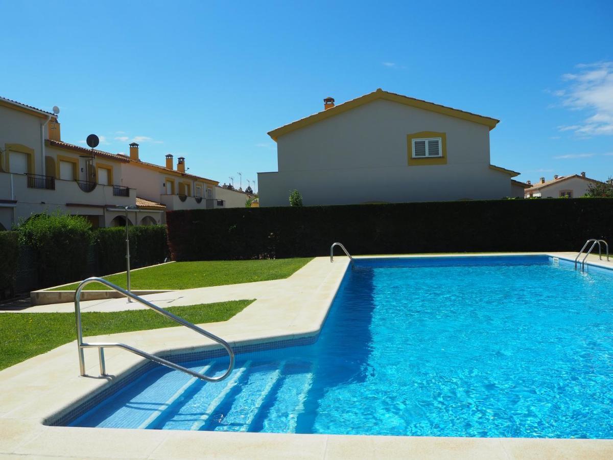 Casa en l'Estartit, piscina, jardín comunitario L'Estartit Exterior foto